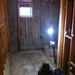 Tearing out the old basement bathroom!