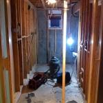 Tearing out the old basement bathroom!