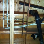 Installing the new Pex system for water to the bar, bathroom sink and tub.