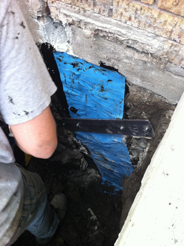 Fixing foundation cracks - bolting on the support bracket