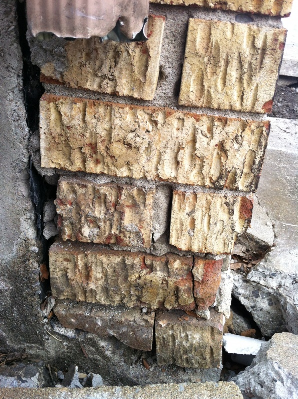 Cracks and broken down mortar in the bricks