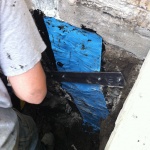 Fixing foundation cracks - bolting on the support bracket