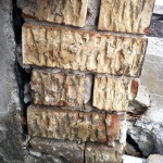 Cracks and broken down mortar in the bricks