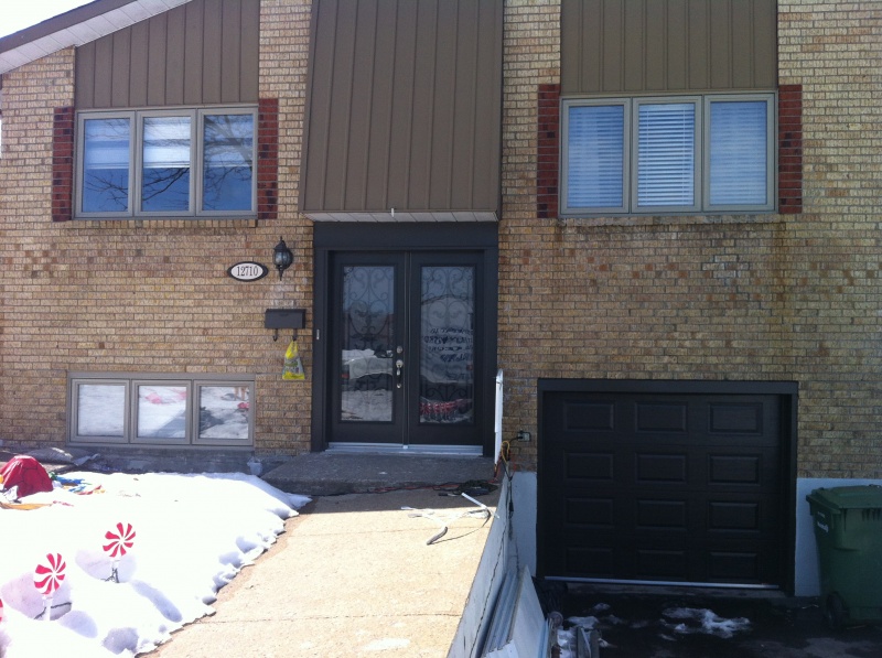 Ripped out the old garage door and installed new one to match the color of the front doors.