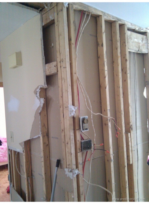 Tearing out the kitchen and small bedroom wall!