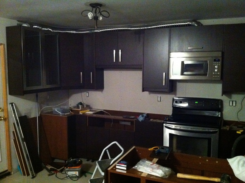 Kitchen cabinets and doors installed!  Time for detailing (kickplates and remaining panels) and countertops!