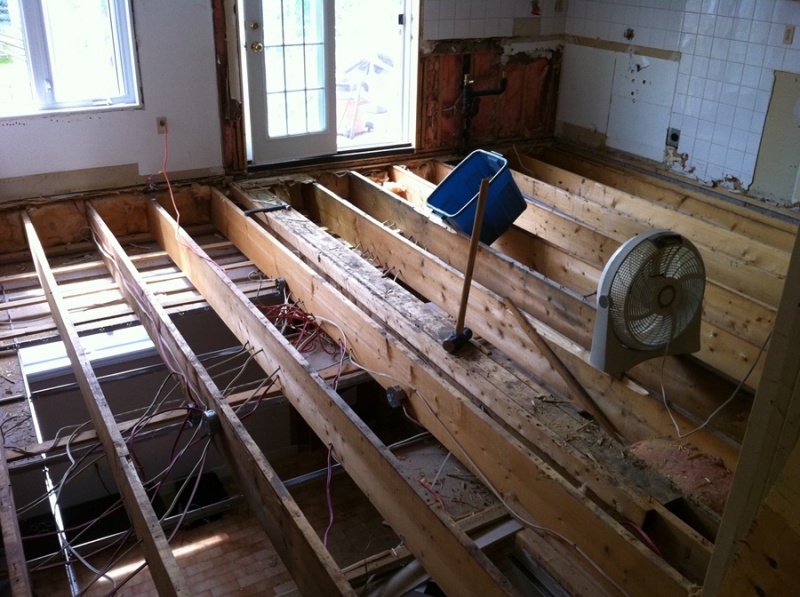 Fixing the floor beams and building up the subfloor!