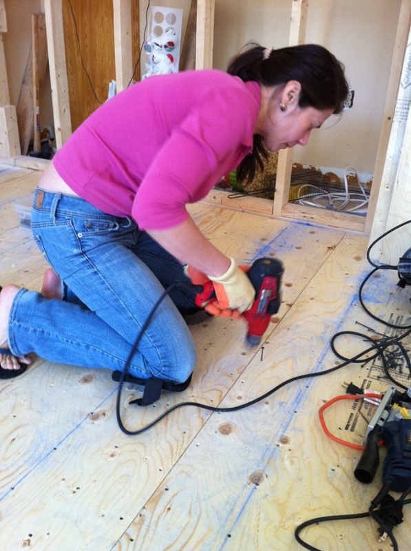 Building up the subfloor! Maibbeth lends a hand :)