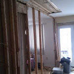 Tearing out the kitchen and small bedroom wall!