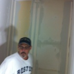 Getting the drywall mudding done! James working hard...