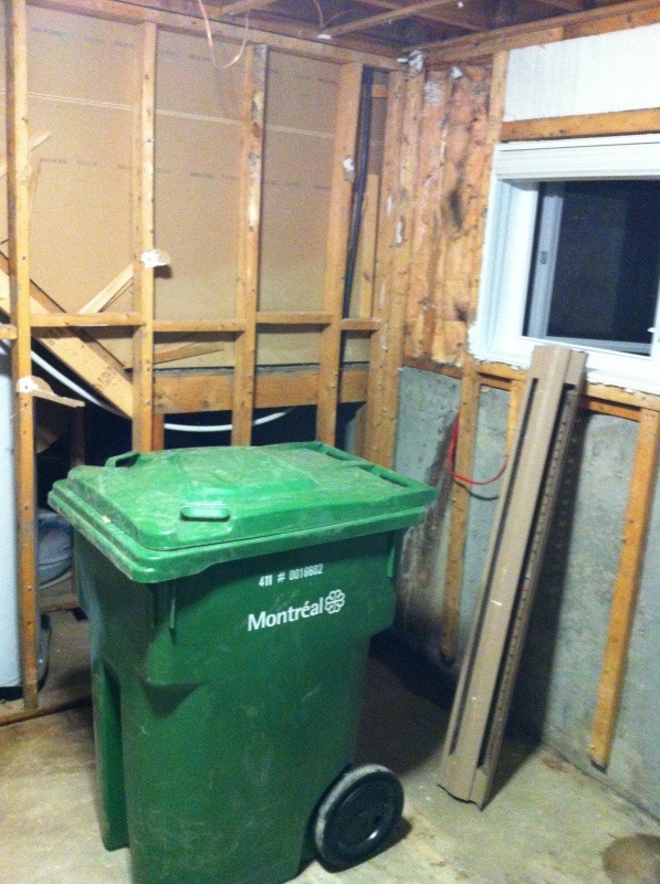 Drying out the office after tearing out all walls and floors... wet areas are where bleach was poured to clean up mold stains and general nastiness.