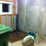 Drying out the office after tearing out all walls and floors... wet areas are where bleach was poured to clean up mold stains and general nastiness.