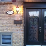 New light, address sign and mailbox to match the doors and windows.